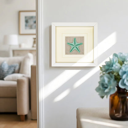 Grüner Seestern Wanddeko in Weißem Rahmen